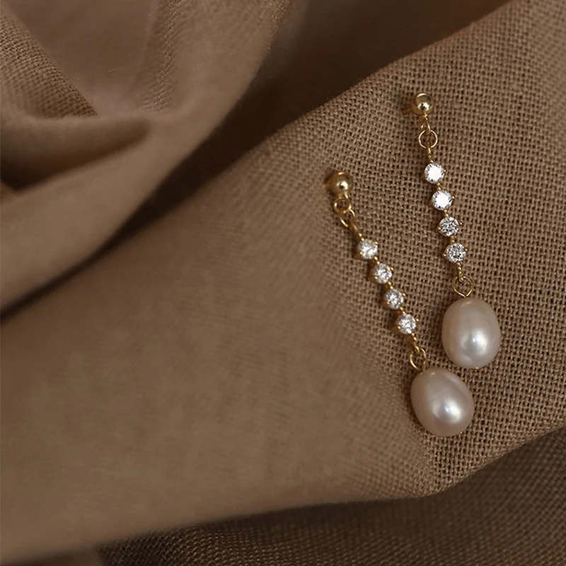 Pendientes de perlas largos para mujer Elegancia atemporal para realzar tu temperamento y estilo femenino Joyería sofisticada ideal para cualquier ocasión.