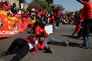 Members of trade unions Cosatu and Saftu march through the Pretoria CBD to the Union Buildings during the national strike against the cost of living.