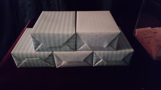 Chanyeol's finished gift wrapping of perfumes for his fans. 