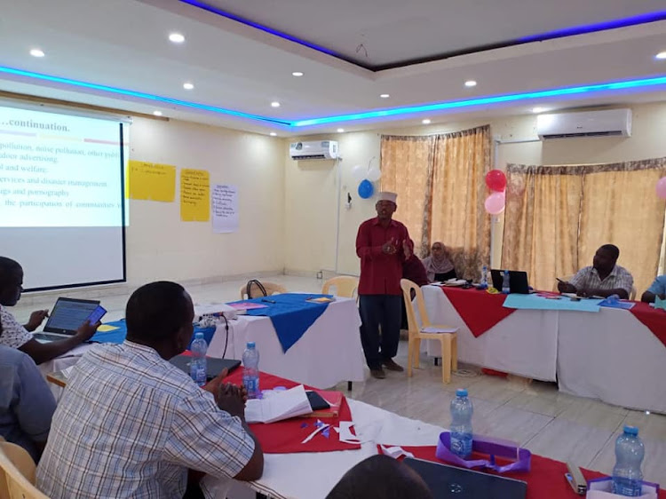 Lamu county education chief officer Abdalla Ahmed speaks during the meeting yesterday