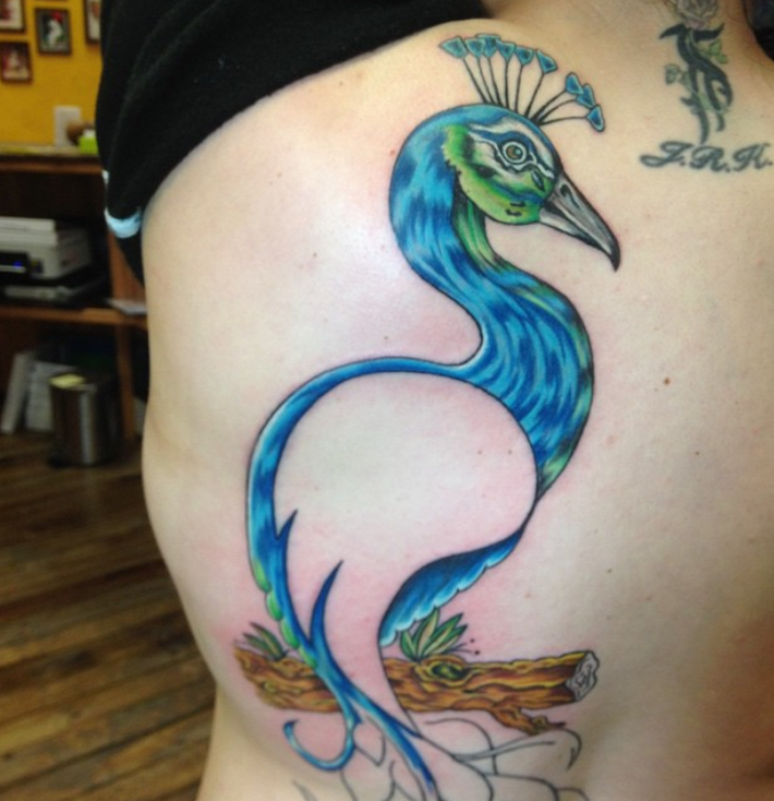 Trendy & Colored Peacock Tattoo