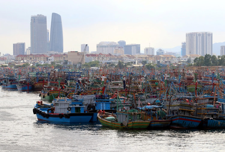 Fishing boats are seen at a port after returning to avoid Molave typhoon in Da Nang city, Vietnam October 26, 2020