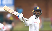 Oshada Fernando of Sri Lanka celebrate scoring 50 runs during day 3 of the 2nd Castle Lager Test match between South Africa and Sri Lanka at St George's Park on February 23, 2019 in Port Elizabeth, South Africa.  