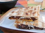 Grilled Black Bean and Cheese Quesadillas was pinched from <a href="http://realmomkitchen.com/12300/grilled-black-bean-and-cheese-quesadillas/" target="_blank">realmomkitchen.com.</a>