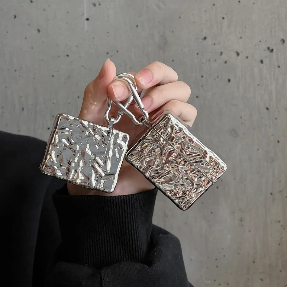 Housse de protection à motif de papier d'aluminium plissé. Protection élégante contre les rayures, les chocs et plus encore. Gardez vos objets en sécurité avec style