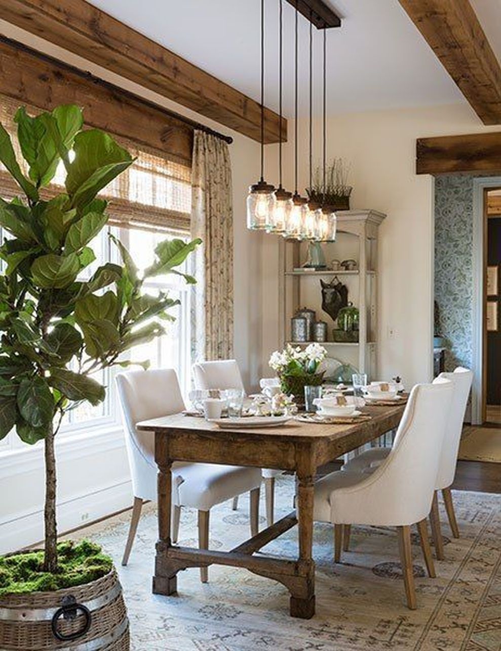  A Long Dining Table in a Rustic Hall