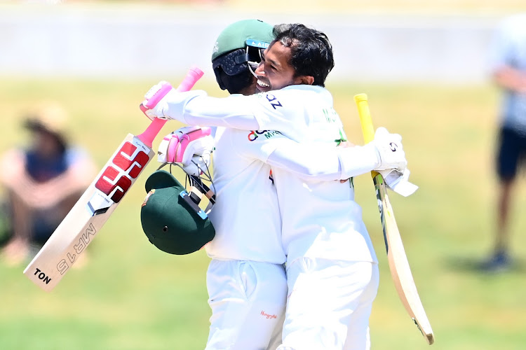 Bangladesh players celebrate after victory by eight wickets over New Zealand in New Zealand.