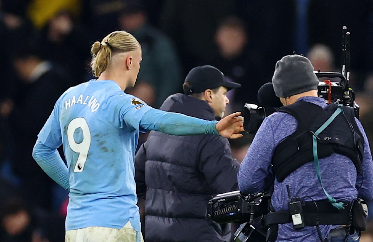 Erling Haaland reacts after Manchester City's Premier League draw against Chelsea at Etihad Stadium in Manchester on Saturday.