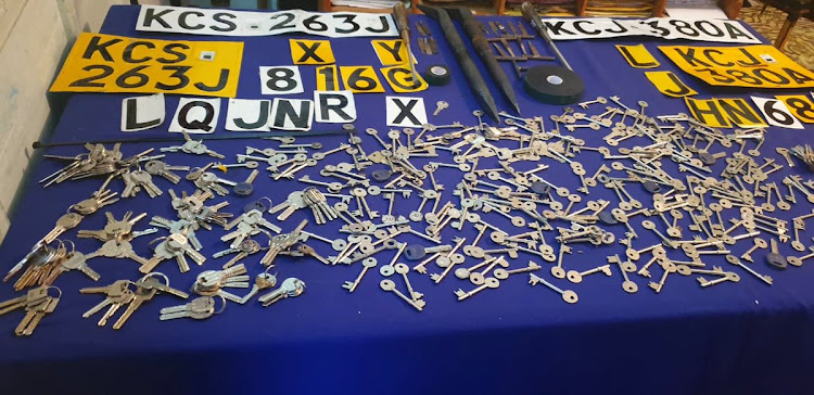 A bunch of number plates and keys confiscated by authorities in a past raid at Kilimani, Nairobi/