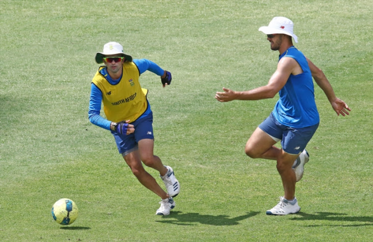 Keshav Maharaj ( l) and Aidan Markram during the South African national men's cricket team training session at Kingsmead Stadium on February 11, 2019 in Durban, South Africa.