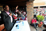 Rallying call: Panyaza Lesufi addresses Swallows fans at the Ipelegeng Community Centre in Soweto yesterday. Picture credits: Veli Nhlapo