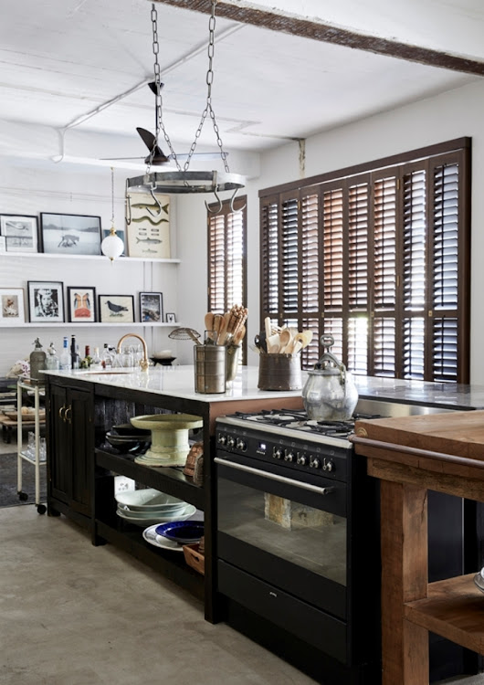 The free-standing island in the kitchen features additional storage space.