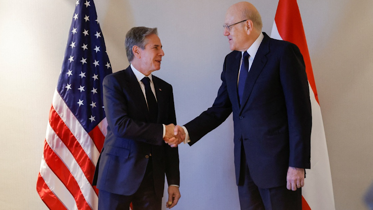 US Secretary of State Antony Blinken meets with Lebanese Caretaker Prime Minister Najib Mikati at his hotel during a day of meetings, amid the ongoing conflict between Israel and the Palestinian group Hamas, in Amman, Jordan, November 4, 2023.