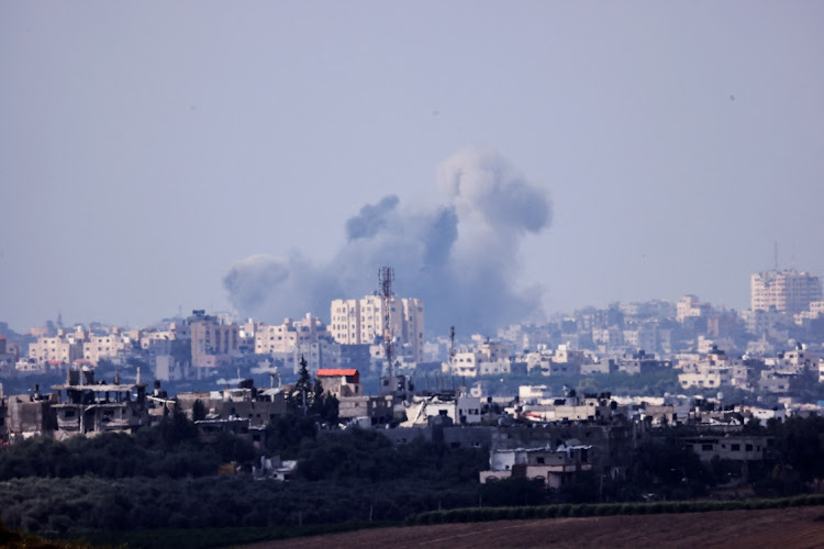 Smoke rises in the air above Gaza following Israeli bombings, as seen from Israel's border with the Gaza Strip, in southern Israel, on October 16 2023.