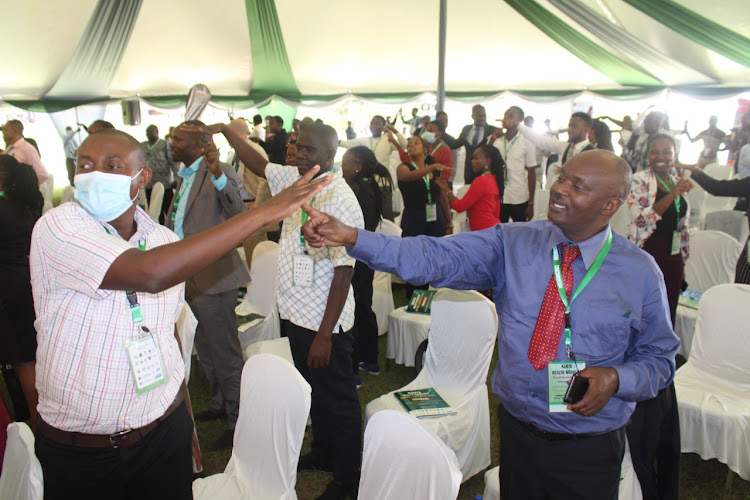 Kenya Union of Clinical Officers chairman Peterson Wachira, Kisumu governor Anyang' Nyong'o and Kenya Medical Practitioners, Pharmacists and Dentists' Union (KMPDU) Secretary General Davji Atellah during Kenya Health Workers Annual Conference at Safari Park Hotel, Nairobi on March 16, 2022/ANDREW KASUKU