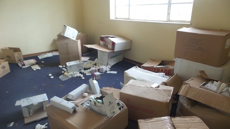 Medicines, patient files and medical equipment are strewn across the floors of the Emmanuel Haven Wellness Centre. In some of the photos we took (but have not published), patient names can be seen on the files.