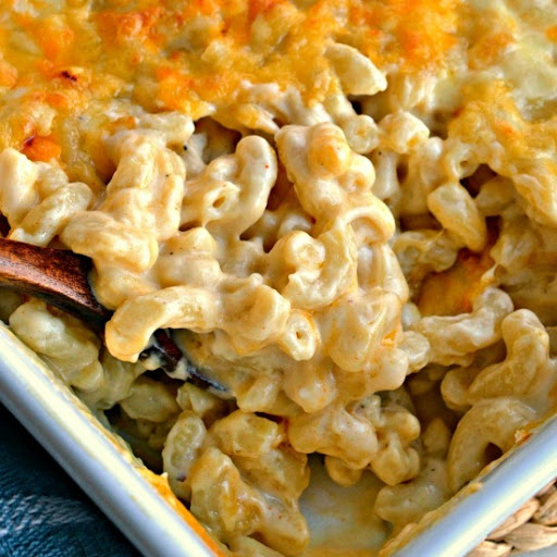 A super creamy cheesy Baked Macaroni and cheese made with a winning three cheese combination of sharp cheddar, white cheddar and Gruyere cheese.  This recipe serves a crowd so if you have a smaller crowd simply cut it in half.