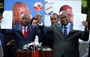 Felix Tshisekedi (R), leader of Congolese main opposition, the Union for Democracy and Social Progress (UDPS) party, and Vital Kamerhe, leader of the Union for the Congolese Nation (UNC) party, hold their pre-election agreement at a news conference in Nairobi, Kenya November 23, 2018. 