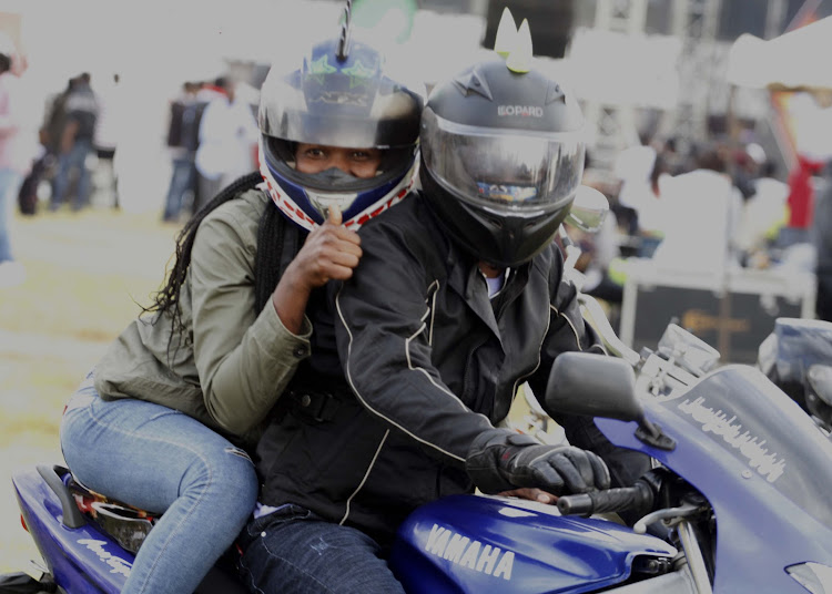 Bikers Godfrey Otieno and Rose Njoroge