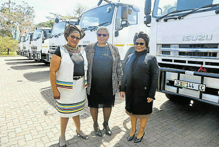 Amathole District Municipality ADM mayor Winnie Nomfusi Nxawe with the provincial head of water and sanitation Portia Makhanya and deputy minister of water & sanitation Pam Tshwete at the handover of 10 new water trucks for local municipalities in ADM.