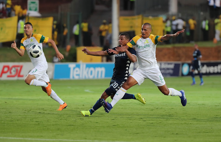 Wayne Arendse of Mamelodi Sundowns fouls Fagrie Lakay of Bidvest Wits.