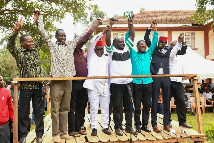 National Assembly Speaker Moses Wetang'ula with Bungoma governor Ken Lusaka, UDA and Ford Kenya MP's hold hands as a sign of unity on Saturday.