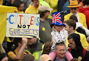 Protesters hold up placards saying 'Not My King' in Trafalgar Square close to where Britain's King Charles III and Britain's Camilla, Queen Consort will be crowned at Westminster Abbey in central London on May 6, 2023. - The set-piece coronation is the first in Britain in 70 years, and only the second in history to be televised. Charles will be the 40th reigning monarch to be crowned at the central London church since King William I in 1066. Republican opponents who want an elected head of state plan to protest on the day with signs declaring 