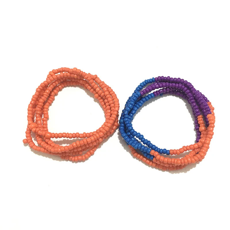 Ensemble deux pièces chaîne de taille de plage en perles de couleurs faites à la main multicouches. Accessoire parfait pour un look estival et élégant.