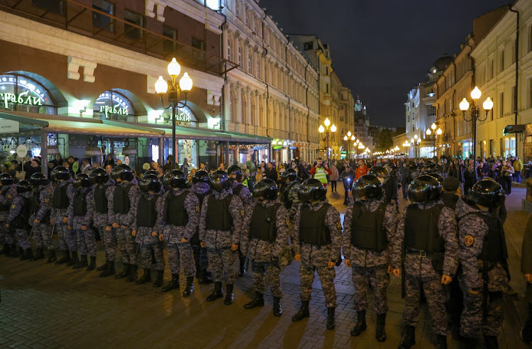 Russian police officers stand guard during an unsanctioned rally, after opposition activists called for street protests against the mobilisation of reservists ordered by President Vladimir Putin, in Moscow, Russia on September 21 2022. Picture: REUTERS/REUTERS PHOTOGRAPHER