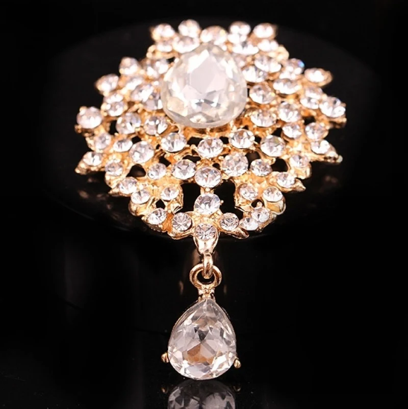Fashion Alloy Rhinestone Crystal Drop Pin Chest. Enhance your attire, adding sparkle and elegance. A striking accessory 