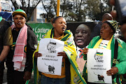 Supporters of former president Jacob Zuma register their protest against president Cyril Ramaphosa outside the ANC KZN provincial conference on Sunday. 