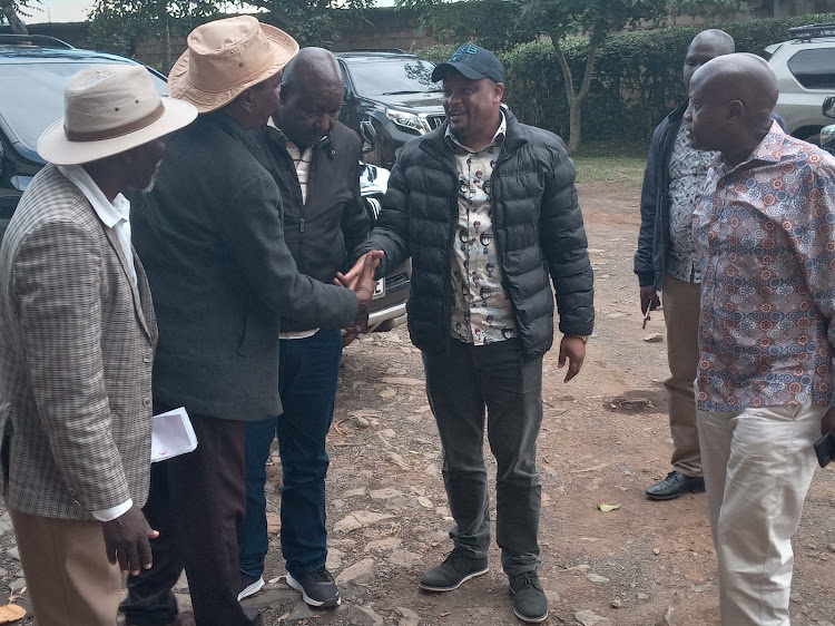 FROM LEFT TO RIGHT-Residents of Sotik welcome MPs Justice Kemei(Sigowet/Soin), Brighton Yegon(Konoin) and Patrick Osero (Borabu) to a meeting at Sotik NCPB when the Parliament Committee on Agriculture and Livestock Development conducted inspection visits in Bomet and Narok counties.