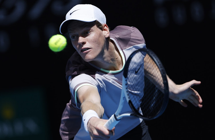 Jannik Sinner of Italy in action against Novak Djokovic of Serbia during their men's semifinal at the Australian Open.