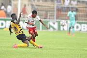 Kgotso Moleko of Chiefs tackles Shaune Mogaila of Highlands Park./Lefty Shivambu/Gallo Images