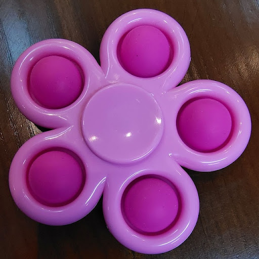 Title 4, Custom 5-Sided Finger Flip Toy. A unique stress...