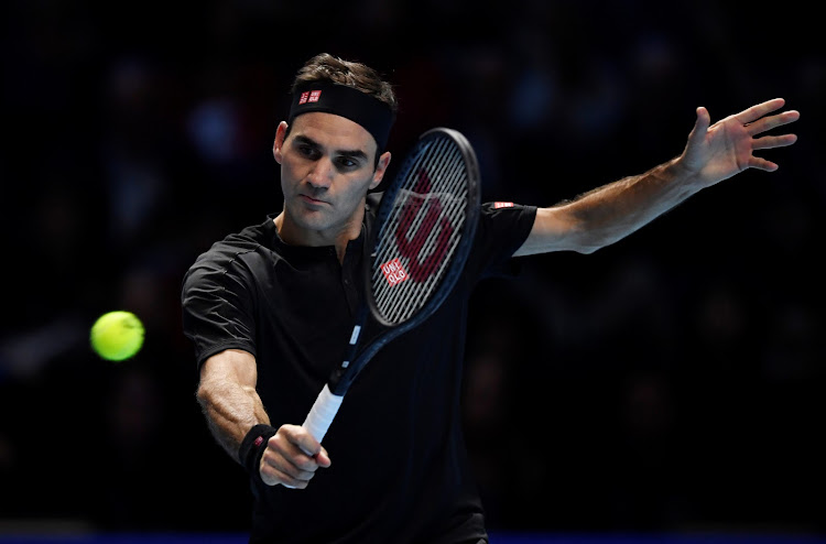 Switzerland's Roger Federer in action during his group stage match against Serbia's Novak Djokovic