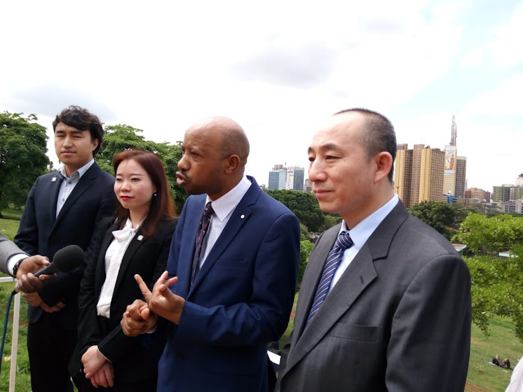 Dr Macharia Gakuru, the founder of Kidney Research Kenya, and Chinese colleagues at Afya House on May 28