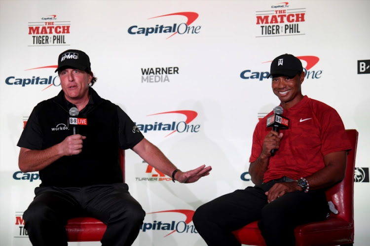 Phil Mickelson and Tiger Woods speak with the media during a press conference before The Match at Shadow Creek Golf Course on November 20, 2018 in Las Vegas, Nevada.