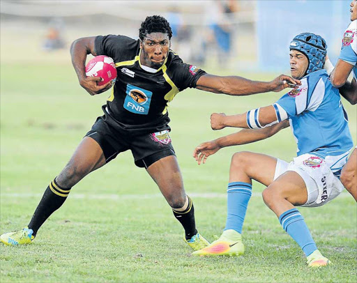 HOT ON THE TROT: Somila Jho fends off CPUT’s Chad Kleinsmidt in a Varsity Shield match earlier this season. Jho was awarded the Play that Rocks award after the tournament final Picture: NASIEF MANIE