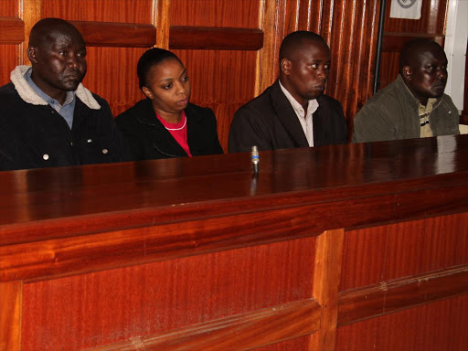 Senior sergeant Fredrick Leliman, sergeant Leonard Mwangi, constable Silvia Wanjiku and corporal Stephen Chebulet appear at Milimani law courts over the murder of human rights lawyer Willie Kimani and two others, August 26, 2016. /PHILIP KAMAKYA