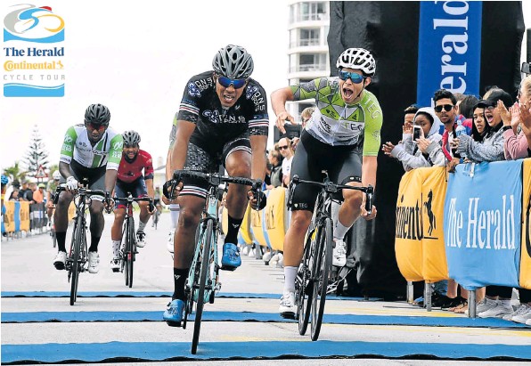 Nolan Hoffman crosses the line ahead of Ryan Harris to win the 106km race in the Herald Continental Cycle Tour in Port Elizabeth on Sunday