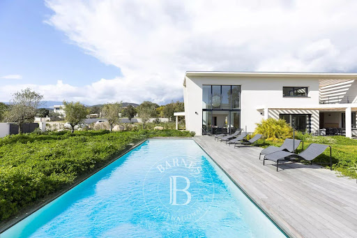 Modern villa with pool and wooden terrace in this luxury villa for sale in Porto-Vecchio ($3,044,114 - 260 m²)