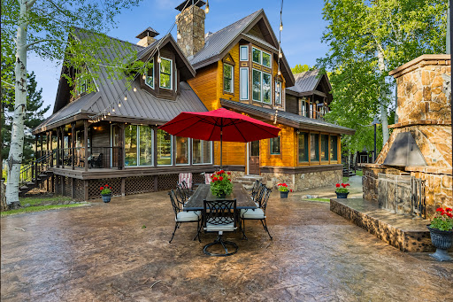 Wooden house with terrace and outdoor fireplace in this luxury property for sale in Pagosa Springs ($29,995,000)