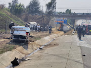 ER24 said a chemical truck was lying on its side and two light motor vehicles were a short distance away, one alight and the other on its roof.