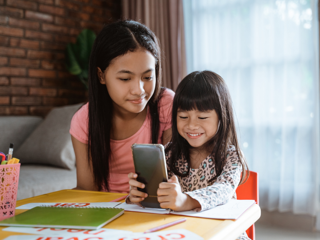 Parent using educational app with their child