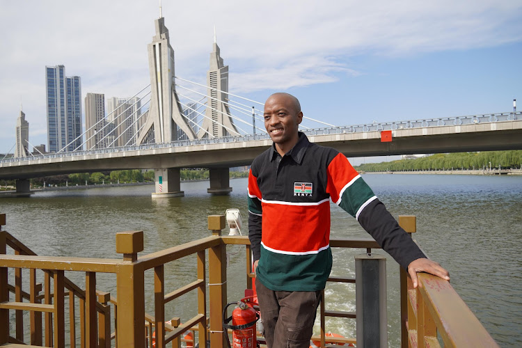 The writer takes a boat ride on the Beijing-Hangzhou Grand Canal in China on October 13