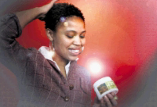 Hair products tested by Kgomotso Taje at The Times offices in Rosebank. Pic: Sydney Seshibedi. I 06/10/2009. © The Times.