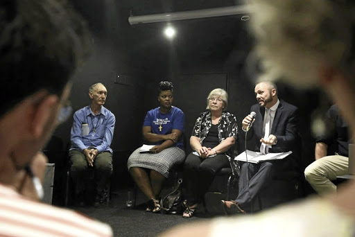 John Wotherspoon, Glory Matipile, Patricia Gerber and Marcel van der Walt on the panel talking about South African citizens in prisons abroad. / THULANI MBELE