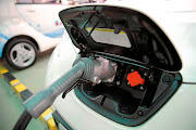 An electric vehicle being charged.