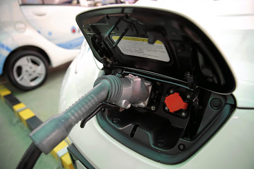 An electric vehicle being charged. Picture: REUTERS
